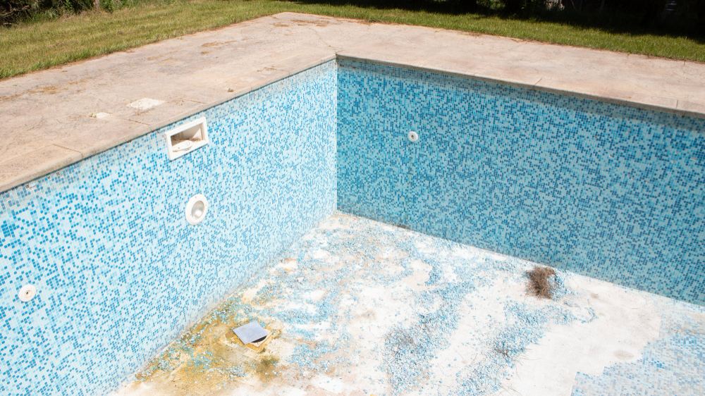 Pool waterproofing being applied to a pool shell.